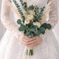 Bridal bouquet with preserved foliage and dried flowers is perfect for a minimalistic wedding theme. A beautiful mix of preserved eucalyptus, dried pampas grass, preserved gypsophila, dried wheat and artificial peonies.
