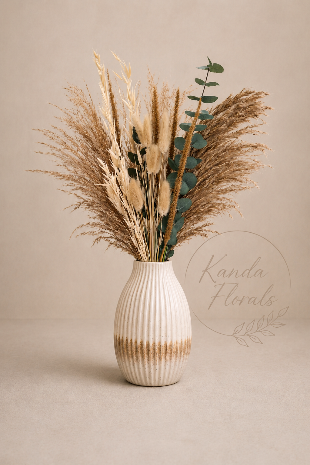 The bouquet includes oats, wild pampas grass, bunny tails, millet and eucalyptus. 