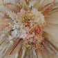 Handmade rustic pink pampas wall hanging floral arrangement with dried flowers and pampas grass