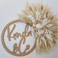 Handmade decorative wall piece made with dried flowers, pampas grass and bunnytails. 