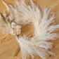 Fluffy white Pampas cake topper wreath
